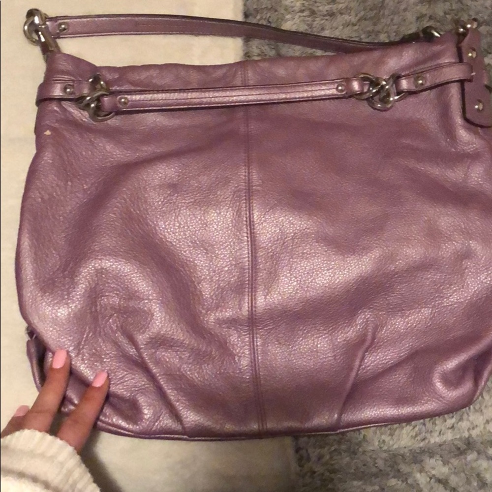 Bundle of authentic used coach bags.